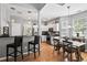 Modern kitchen with white cabinets, stainless steel appliances, and a breakfast bar at 1431 Whispering Oak Trl, Mount Pleasant, SC 29466
