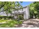 Two-story home featuring tidy landscaping, a side storage shed, and a concrete driveway at 1433 Oaklanding Rd, Mount Pleasant, SC 29464