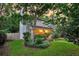 Charming two-story home with landscaped yard and inviting front porch; perfect for relaxation at 1433 Oaklanding Rd, Mount Pleasant, SC 29464