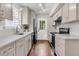 Updated kitchen featuring stainless steel appliances, quartz countertops, and sleek cabinetry at 1433 Oaklanding Rd, Mount Pleasant, SC 29464