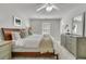 Bright main bedroom featuring soft carpet, neutral-colored walls, and a view from the window at 1433 Oaklanding Rd, Mount Pleasant, SC 29464