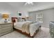 Comfortable main bedroom with a large bed, soft lighting, and calm, neutral colors at 1433 Oaklanding Rd, Mount Pleasant, SC 29464