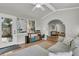 Inviting sun room filled with natural light, tile floors, and comfortable seating area at 1433 Oaklanding Rd, Mount Pleasant, SC 29464