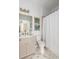 Well-lit bathroom featuring vanity with marble countertop, and shower with tiled flooring at 1532 Sea Palms Cres, Mount Pleasant, SC 29464