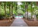 Gated community pool area with lush landscaping and clear signage at 1532 Sea Palms Cres, Mount Pleasant, SC 29464