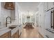 Dining area with a view of the kitchen and a stylish chandelier at 1532 Sea Palms Cres, Mount Pleasant, SC 29464