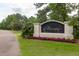 Beautiful stone entrance with lush landscaping and community signage at 1532 Sea Palms Cres, Mount Pleasant, SC 29464