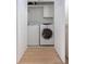 Convenient laundry area with washer and dryer hookups, storage cabinet, and easy access from the hallway at 1532 Sea Palms Cres, Mount Pleasant, SC 29464