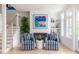 Bright living room features wood floors, fireplace, shiplap accent wall, and stairs at 1532 Sea Palms Cres, Mount Pleasant, SC 29464