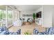 Bright living room with hardwood floors, stylish furnishings, and access to a screened porch at 1532 Sea Palms Cres, Mount Pleasant, SC 29464