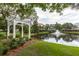 Picturesque pond featuring a fountain, landscaped surroundings, and inviting gazebo at 1532 Sea Palms Cres, Mount Pleasant, SC 29464