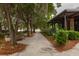 Charming restaurant exterior with tree-lined walkway and outdoor seating area at 1532 Sea Palms Cres, Mount Pleasant, SC 29464