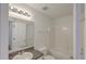 Bathroom featuring a sink, large mirror, and a bathtub with a shower at 159 Townsend Way, Summerville, SC 29483