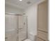 Bright bathroom featuring a glass-doored shower and natural wood cabinets at 159 Townsend Way, Summerville, SC 29483