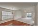 Spacious living room with carpet and sliding glass door that fills the space with natural light at 159 Townsend Way, Summerville, SC 29483