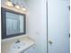 Well-maintained bathroom boasts vanity with framed mirror, sink, and a tiled countertop at 160 Lancashire Rd, Summerville, SC 29486