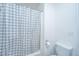 Clean bathroom features a white, patterned shower curtain, toilet, tile floors and neutral walls at 160 Lancashire Rd, Summerville, SC 29486