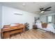 Spacious bedroom with a piano, black ceiling fan, and lots of natural light at 160 Lancashire Rd, Summerville, SC 29486