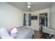 Comfortable bedroom features hardwood style flooring, ceiling fan, closet and window view at 160 Lancashire Rd, Summerville, SC 29486