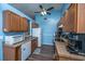 Charming kitchen features wooden cabinets, speckled counter tops, updated appliances, and hardwood style floor at 160 Lancashire Rd, Summerville, SC 29486