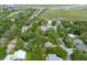 Aerial view of the property in a neighborhood near a marsh and golf course at 1604 Jungle Rd, Edisto Island, SC 29438