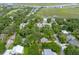 Aerial view of the home in a neighborhood close to the water and a golf course at 1604 Jungle Rd, Edisto Island, SC 29438