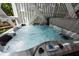 Relax and unwind in this luxurious hot tub with adjustable settings, perfect for year-round enjoyment at 1604 Jungle Rd, Edisto Island, SC 29438