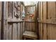 Rustic outdoor shower with wood paneling, offering a refreshing escape after a day at the beach at 1604 Jungle Rd, Edisto Island, SC 29438
