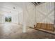 Covered area under house features a wooden swing and offers potential for storage, parking, or recreational space at 1604 Jungle Rd, Edisto Island, SC 29438