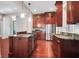 Well-appointed kitchen with stainless steel appliances, granite counters, and rich wood cabinetry at 183 Ionsborough St, Mount Pleasant, SC 29464