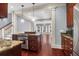 Gourmet kitchen with stainless steel appliances, granite counters, and open layout to living room at 183 Ionsborough St, Mount Pleasant, SC 29464