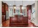 Elegant kitchen with rich wood cabinets, granite countertops, and stainless steel appliances at 183 Ionsborough St, Mount Pleasant, SC 29464