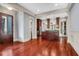 Spacious open-concept kitchen with modern stainless steel appliances and wood flooring at 183 Ionsborough St, Mount Pleasant, SC 29464