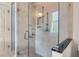 Luxurious walk-in shower with glass enclosure, multiple shower heads, and designer tile at 183 Ionsborough St, Mount Pleasant, SC 29464