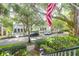 A street view featuring beautiful homes, lush landscaping, and cars parked along the street at 183 Ionsborough St, Mount Pleasant, SC 29464