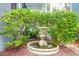 Outdoor fountain surrounded by lush greenery at 183 Ionsborough St, Mount Pleasant, SC 29464