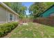 Inviting backyard with a patio, seating, and a well-manicured lawn at 1940 Orangeburg St, North Charleston, SC 29405
