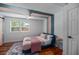 Cozy bedroom featuring modern furnishings, stylish decor, and a serene ambiance at 1940 Orangeburg St, North Charleston, SC 29405