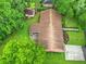 Aerial view showcasing the house with spacious yard, mature trees, and a well-maintained landscape at 1967 Campion Hall Rd, Charleston, SC 29407