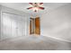 Bedroom featuring neutral walls and carpet, with a ceiling fan and closet at 1967 Campion Hall Rd, Charleston, SC 29407