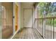 Covered balcony with wood-look flooring and outdoor access, great for entertaining at 2011 N Hwy 17 # 2200H, Mount Pleasant, SC 29466