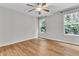 Bedroom with neutral walls, hardwood floors, and dual windows for natural light at 2011 N Hwy 17 # 2200H, Mount Pleasant, SC 29466