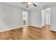 Bedroom featuring hardwood style floors and access to the ensuite bathroom and walk-in closet at 2011 N Hwy 17 # 2200H, Mount Pleasant, SC 29466