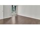 Clean bedroom with hard surface floors and natural light from the window at 2011 N Hwy 17 # 2200H, Mount Pleasant, SC 29466
