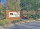 Welcoming brick sign for The Meridian Condominiums, showcasing community pride at 2011 N Hwy 17 # 2200H, Mount Pleasant, SC 29466