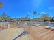 Community deck overlooking pond featuring comfortable seating and scenic views at 2011 N Hwy 17 # 2200H, Mount Pleasant, SC 29466