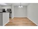 Dining area featuring an elegant chandelier and seamlessly connects to the kitchen and living area at 2011 N Hwy 17 # 2200H, Mount Pleasant, SC 29466