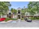 Attractive apartment building with staircase, manicured landscaping, and convenient parking at 2011 N Hwy 17 # 2200H, Mount Pleasant, SC 29466