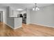 Eat-in kitchen with stainless steel appliances, granite countertops, and stylish pendant lighting at 2011 N Hwy 17 # 2200H, Mount Pleasant, SC 29466