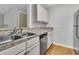 Bright kitchen featuring stainless steel appliances, granite counters, and neutral cabinets at 2011 N Hwy 17 # 2200H, Mount Pleasant, SC 29466